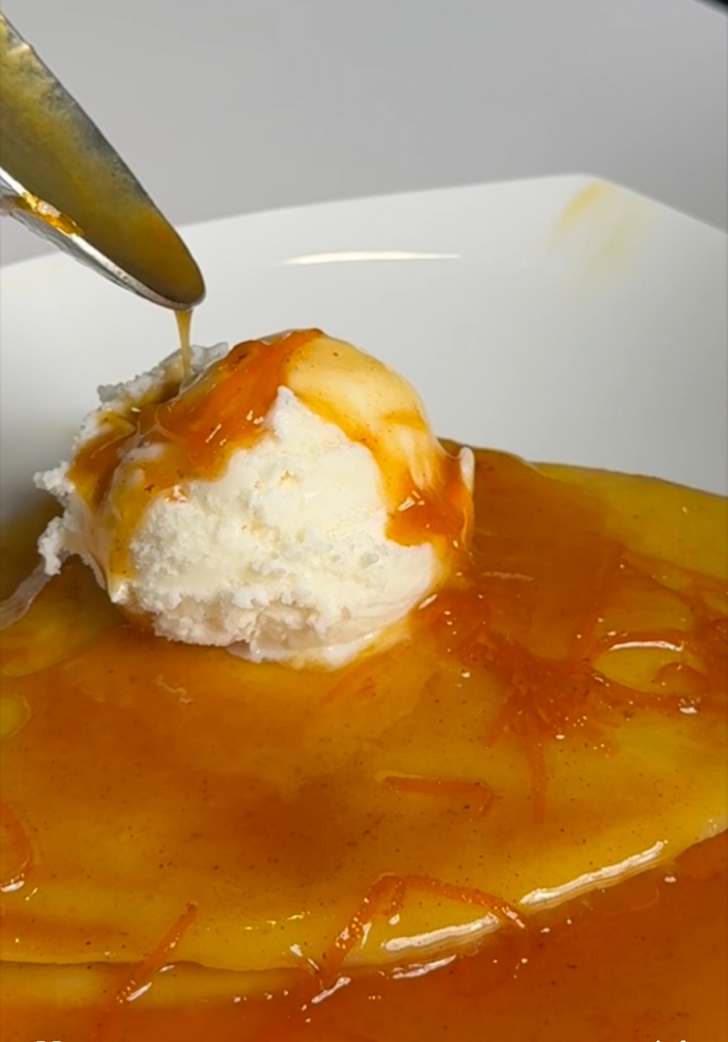 A thin Crepe Suzette, flambéed in orange sauce and grand marnier