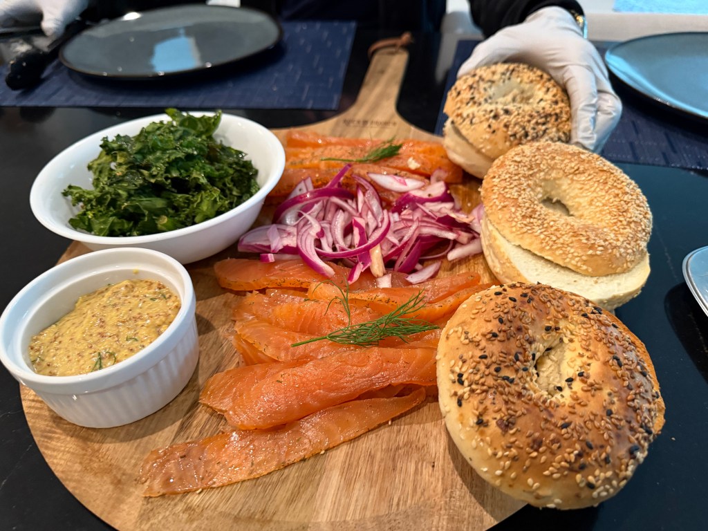 Imagine this: a toasted bagel, generously layered with tangy Swedish mustard sauce, savory gravlax that melts in your mouth, bright pickled onions, and the incredible crunch of herb-infused kale. This isn't just a sandwich; it's a flavor explosion!